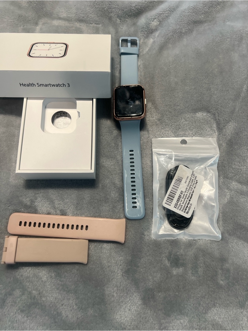 Unbranded Smart Fitness Watch with Blue Strap and Rose Gold Case